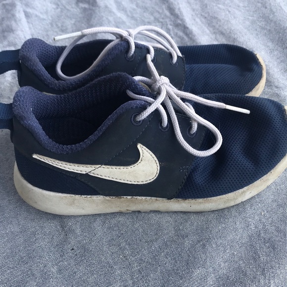 navy and white nikes
